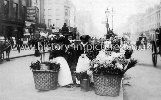 Flower Sellers, Oxford Street, London. c.1910.